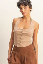 Halter neck buttoned washed top with ribbed texture, moderately stretchy.