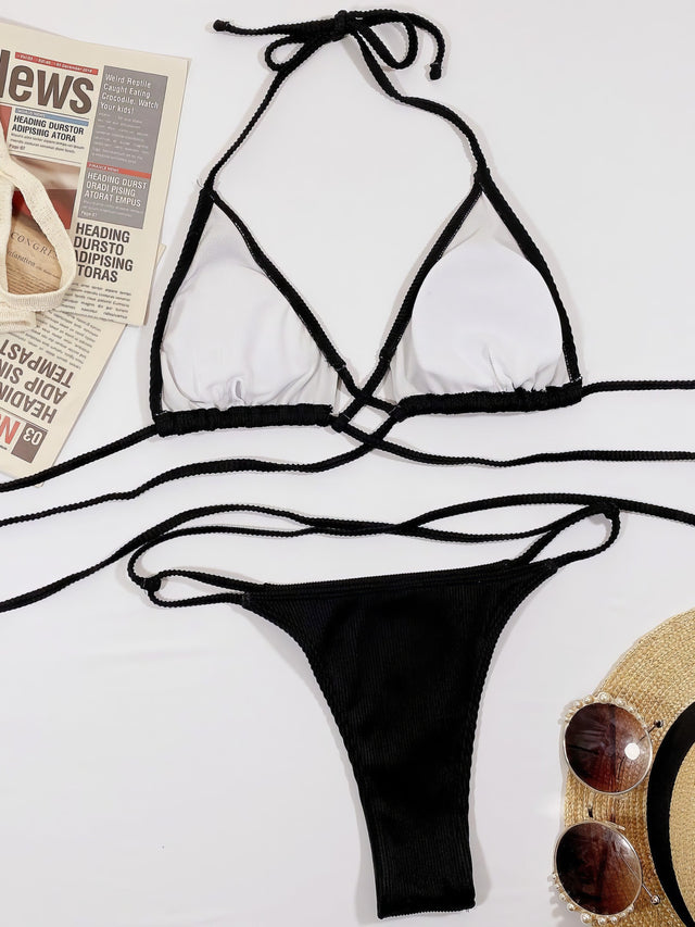Ribbed halter neck crisscross bikini set with high-cut bottoms.