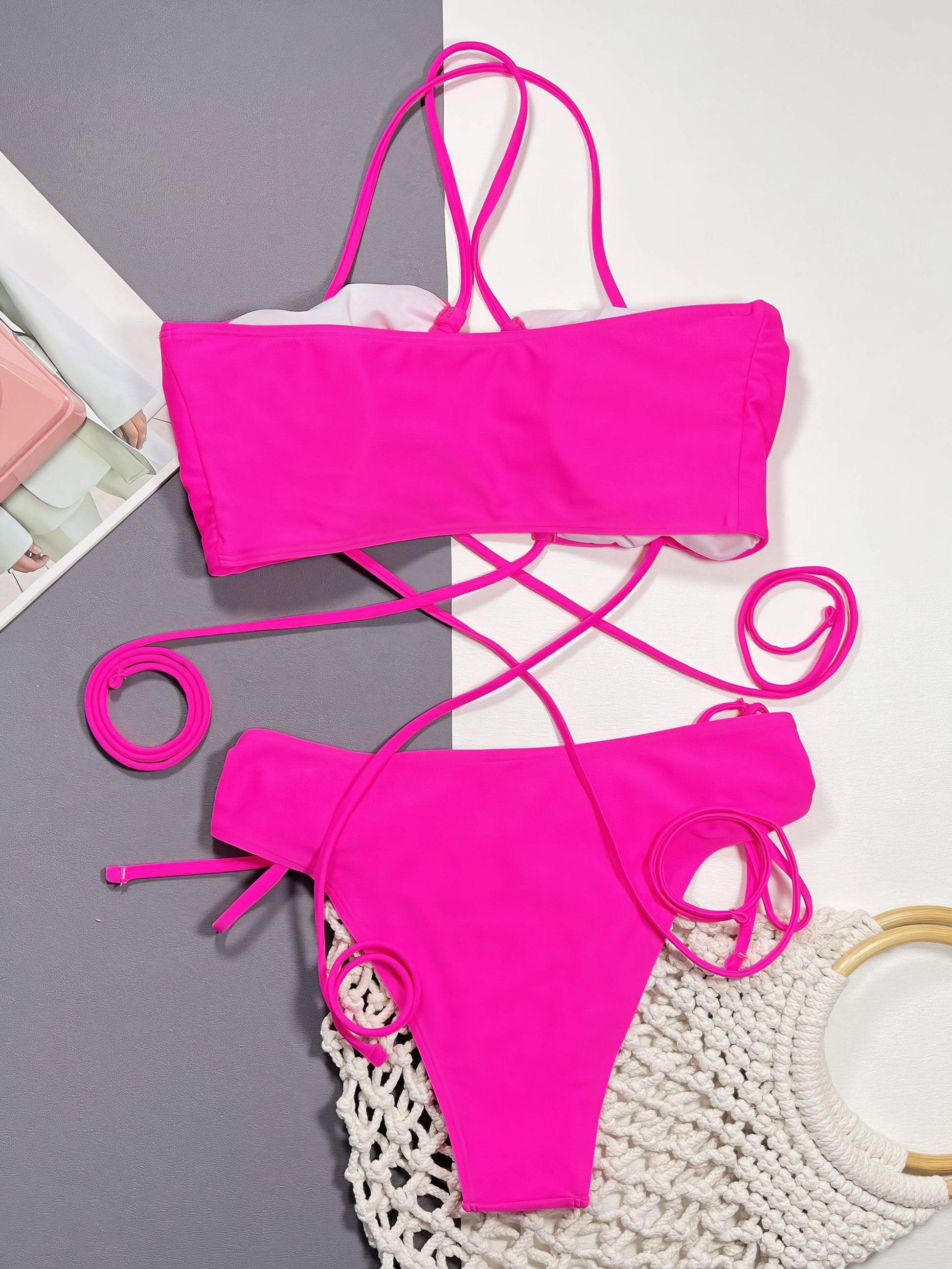 Halter neck bikini set with a crisscross drawstring detail and removable padding.
