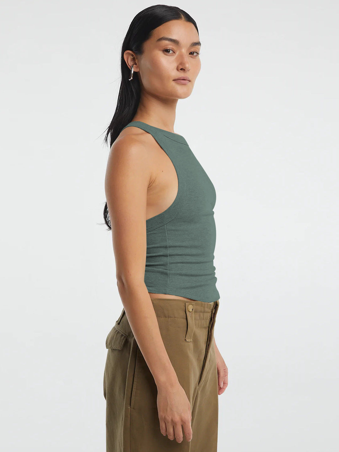 Halter neck ribbed cropped top with backless design.