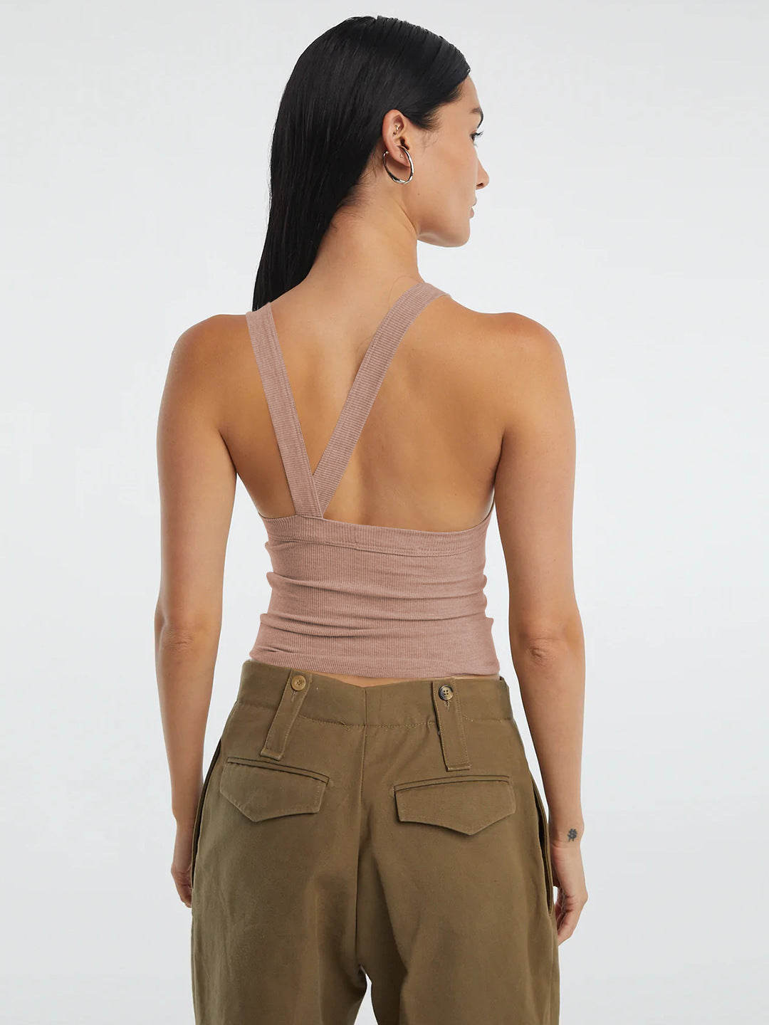 Halter neck ribbed cropped top with backless design.