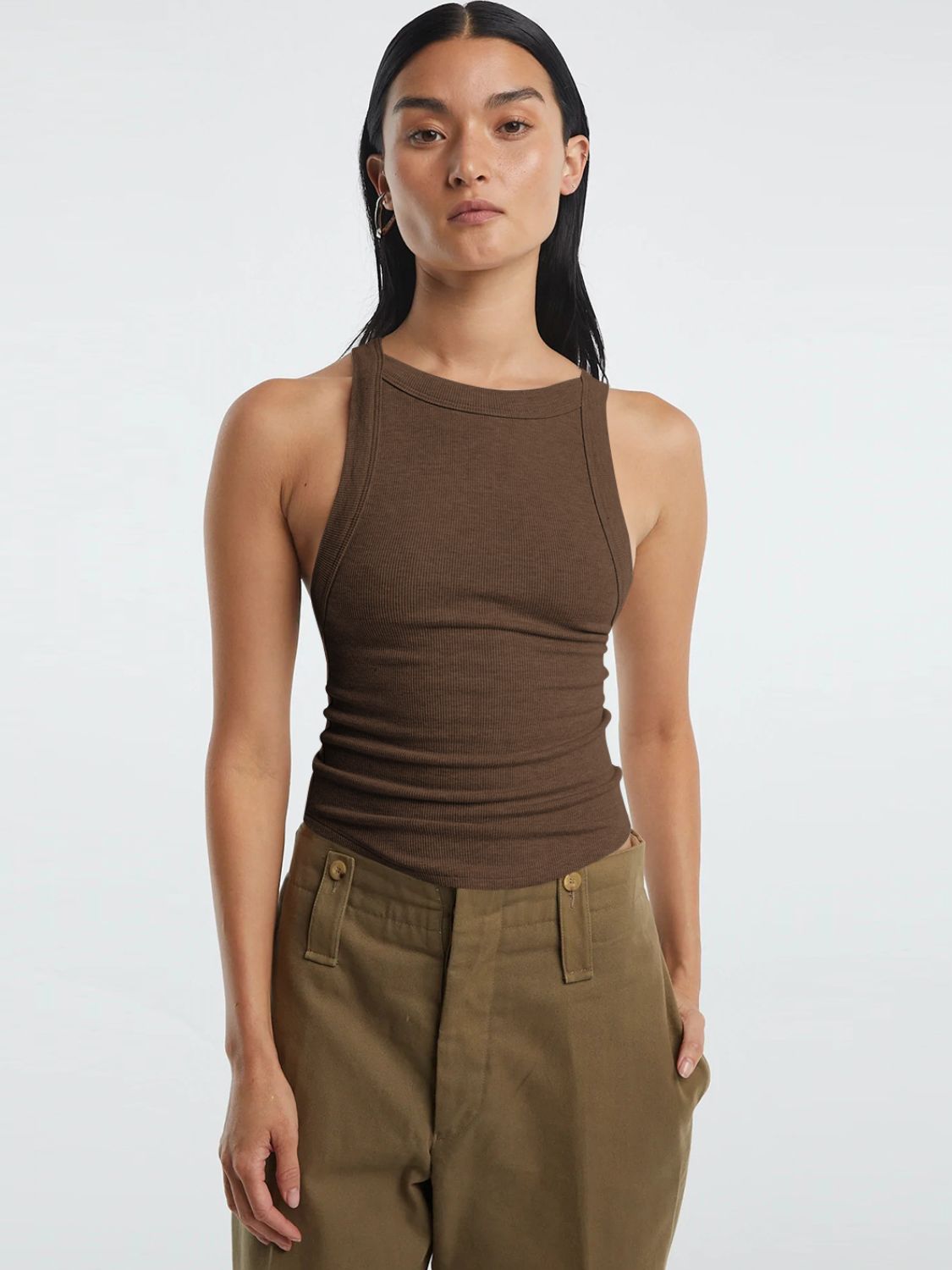 Halter neck ribbed cropped top with backless design.