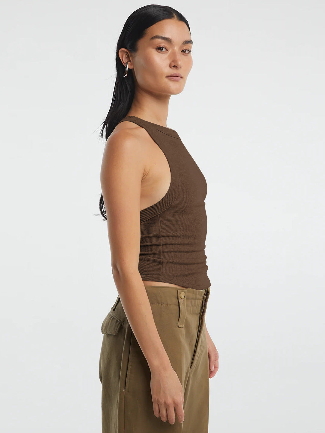 Halter neck ribbed cropped top with backless design.