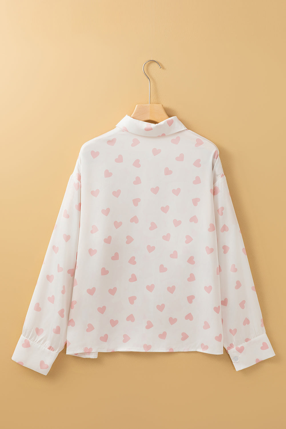 Heart print collared neck long sleeve shirt.