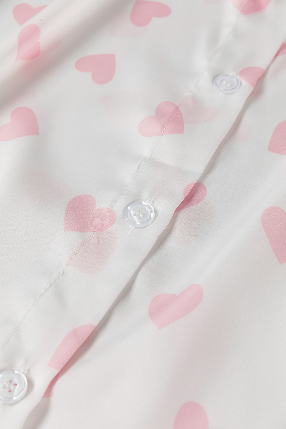 Heart print collared neck long sleeve shirt.