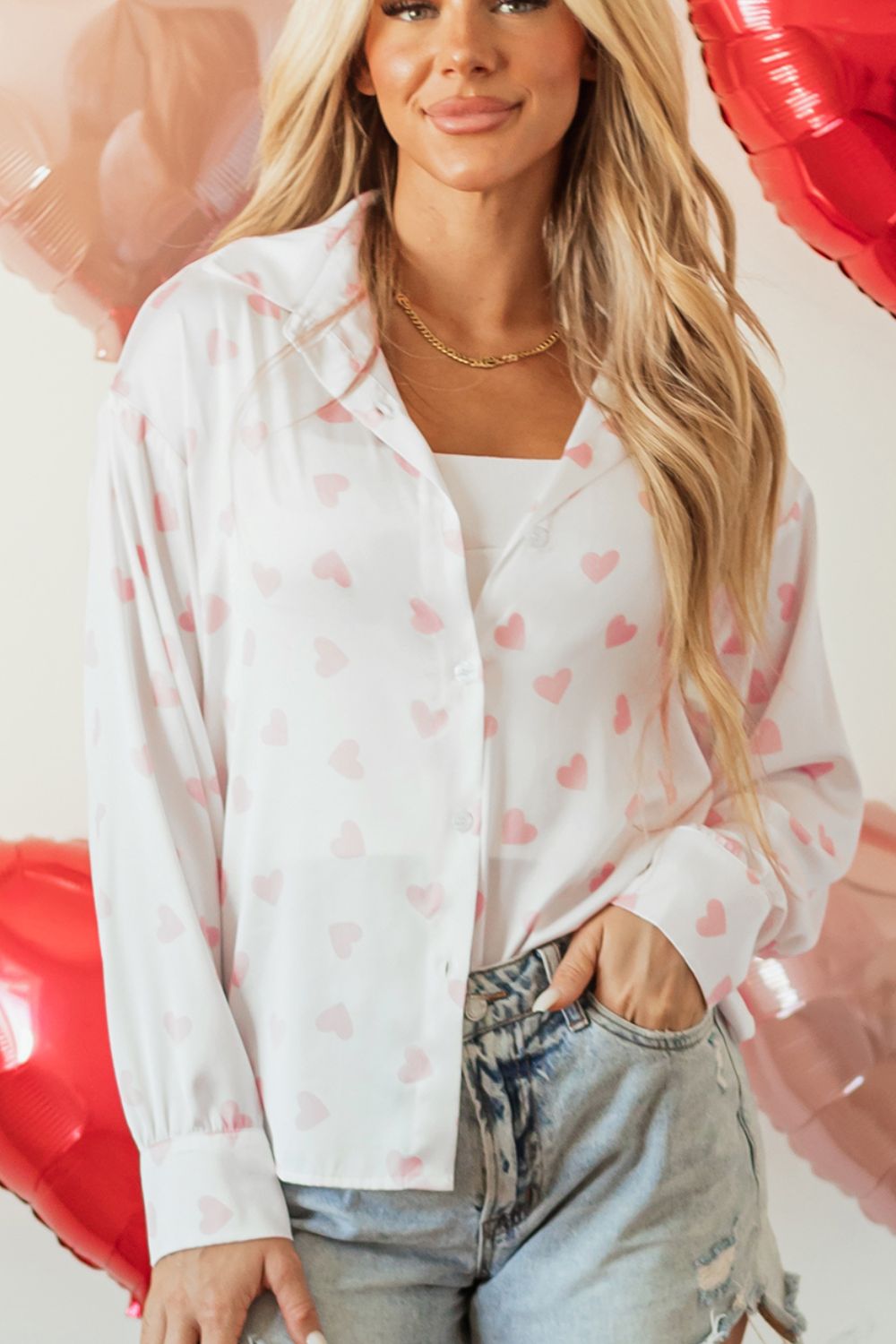 Heart print collared neck long sleeve shirt.