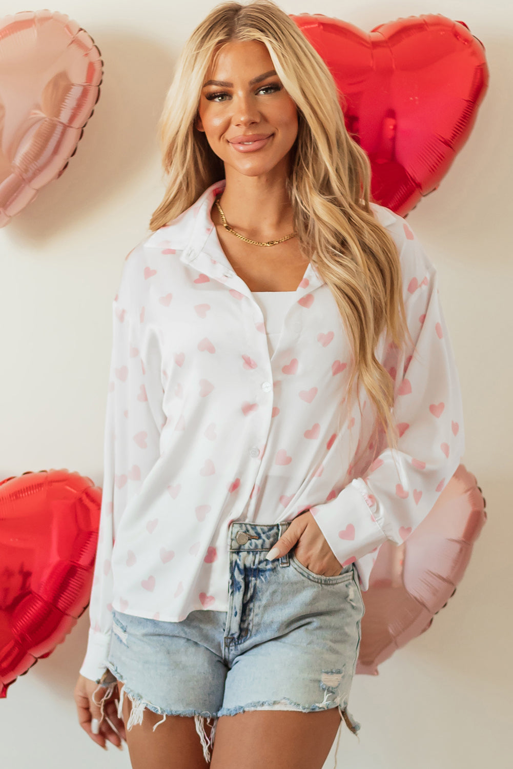 Heart print collared neck long sleeve shirt.