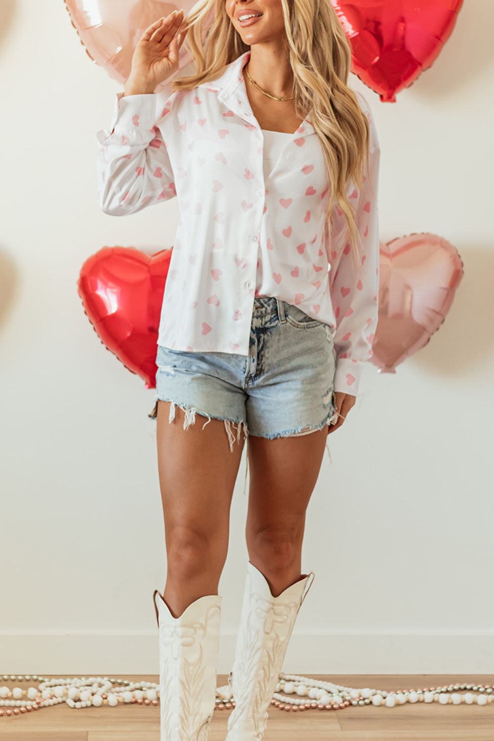 Heart print collared neck long sleeve shirt.