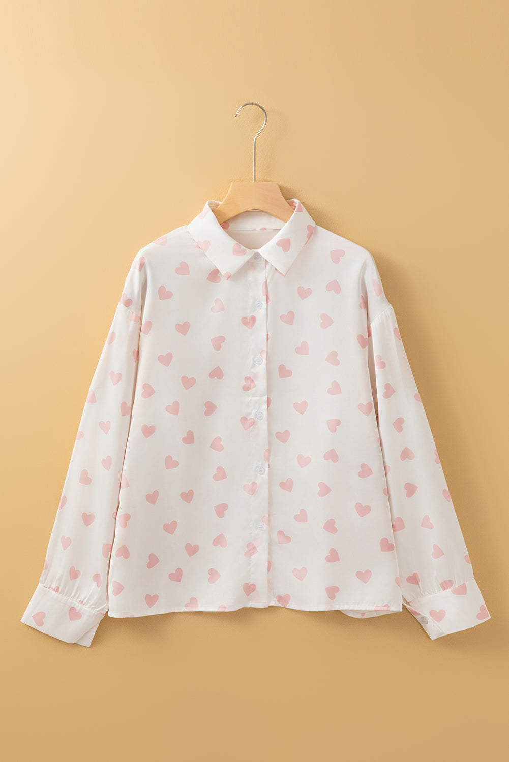 Heart print collared neck long sleeve shirt.