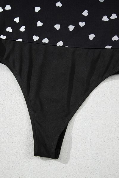 Heart square neck long sleeve bodysuit.