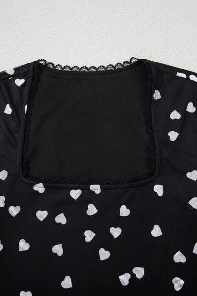 Heart square neck long sleeve bodysuit.