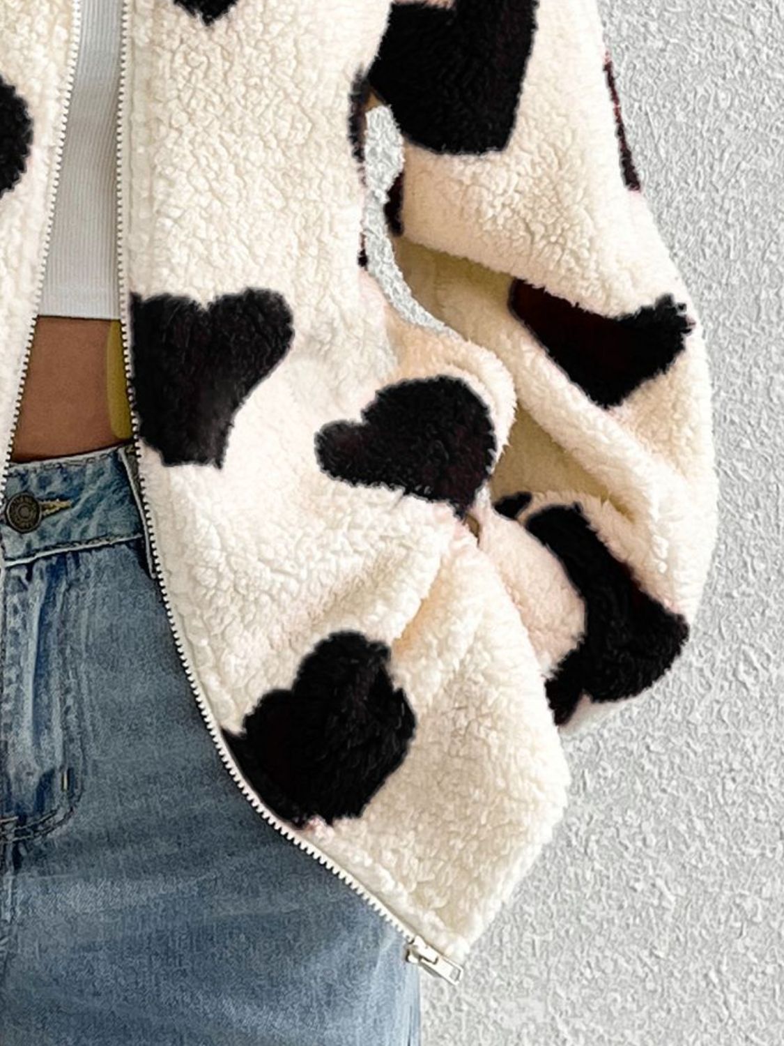 Heart zip up drop shoulder furry jacket.