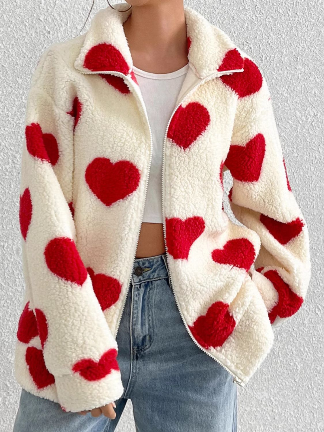 Heart zip up drop shoulder furry jacket.