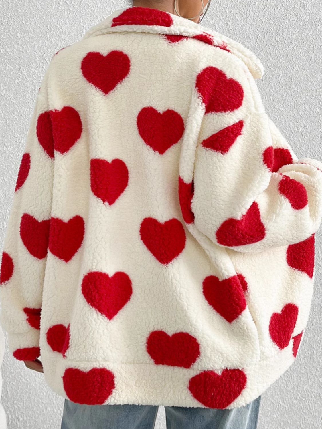 Heart zip up drop shoulder furry jacket.