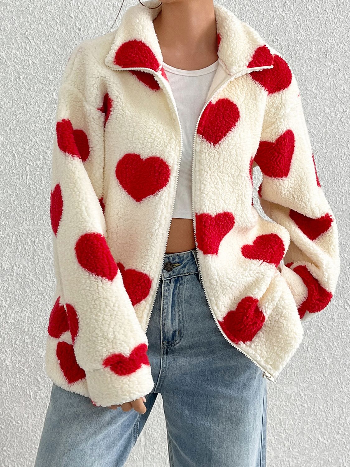 Heart zip up drop shoulder furry jacket.