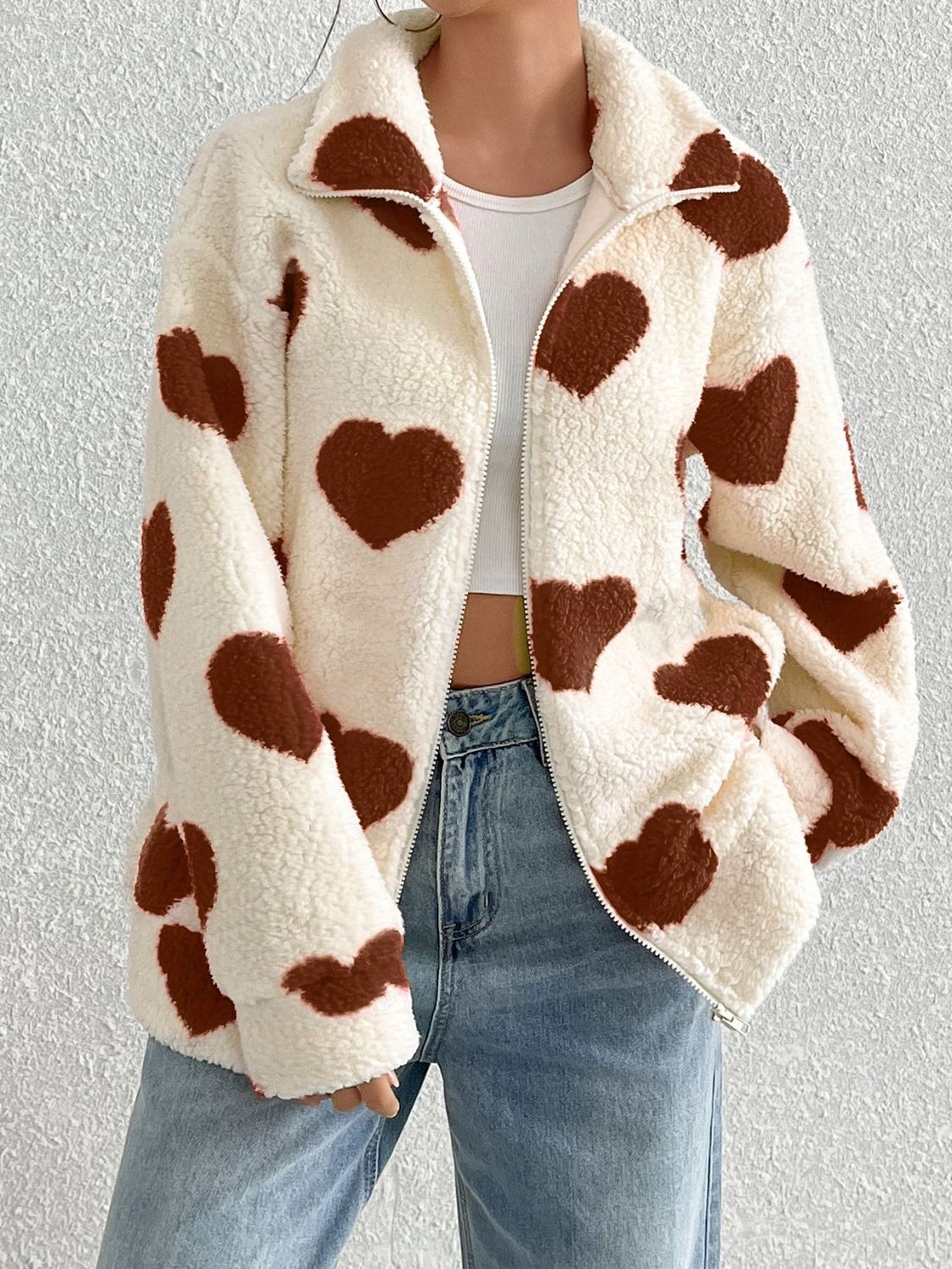 Heart zip up drop shoulder furry jacket.