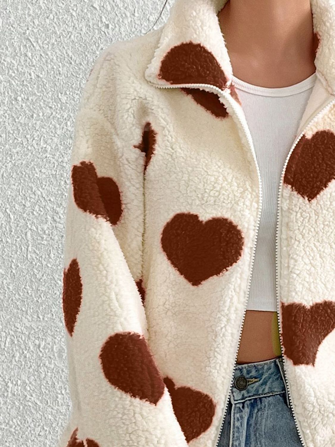 Heart zip up drop shoulder furry jacket.