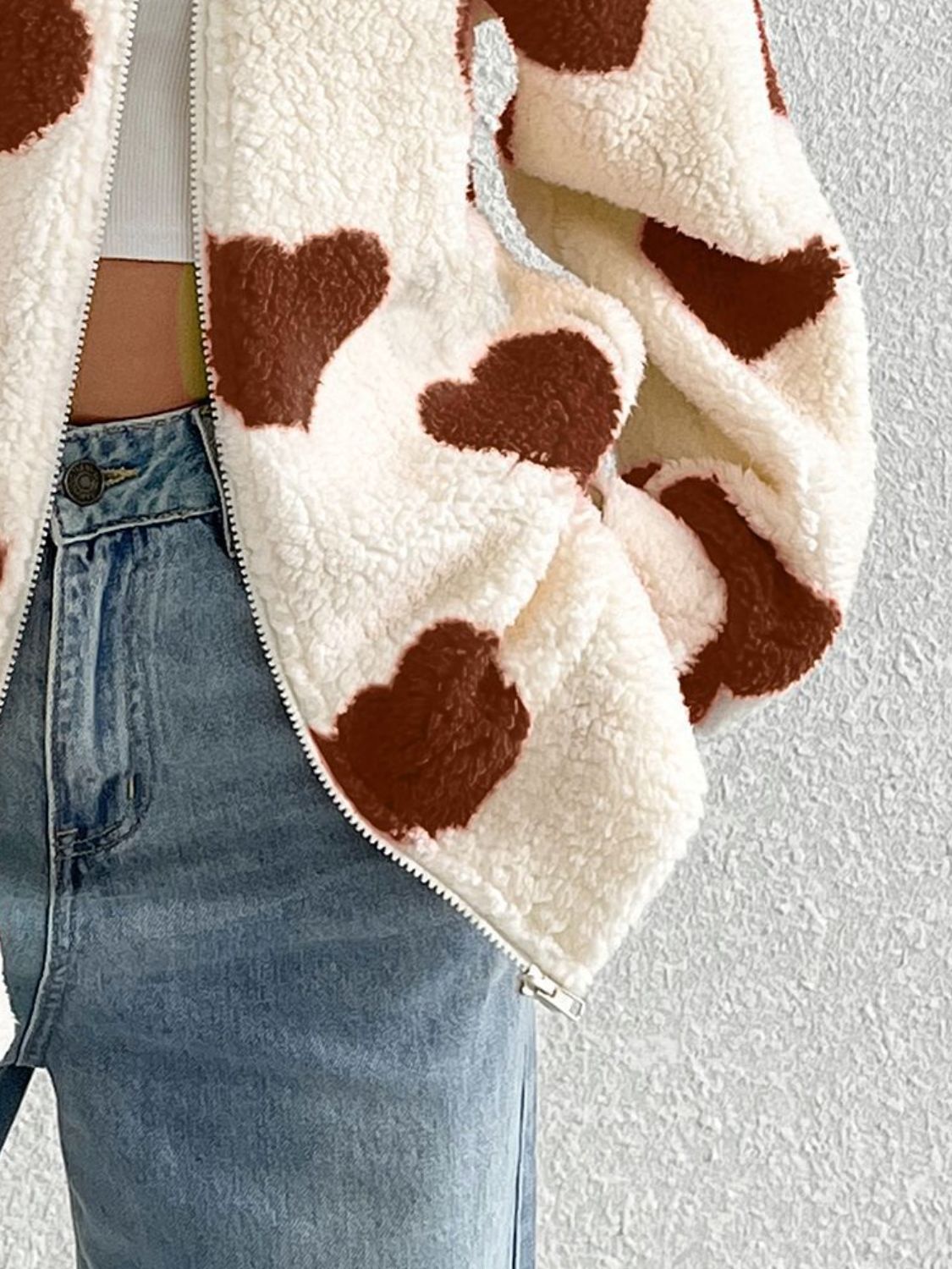 Heart zip up drop shoulder furry jacket.