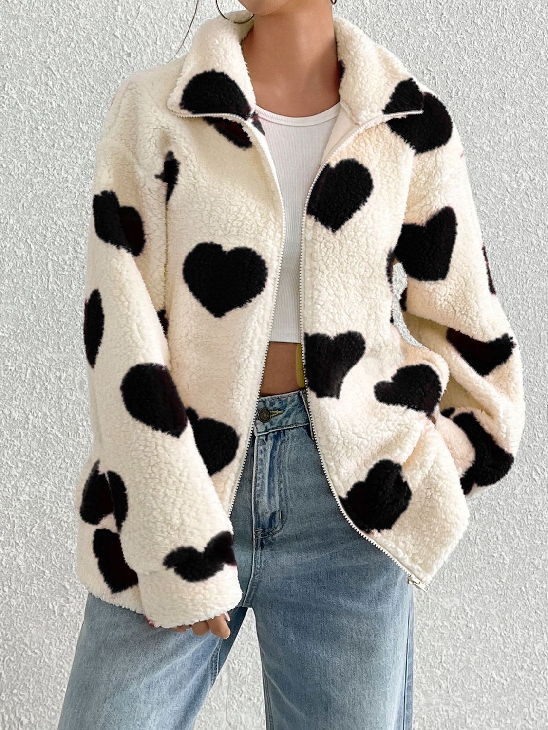 Heart zip up drop shoulder furry jacket.