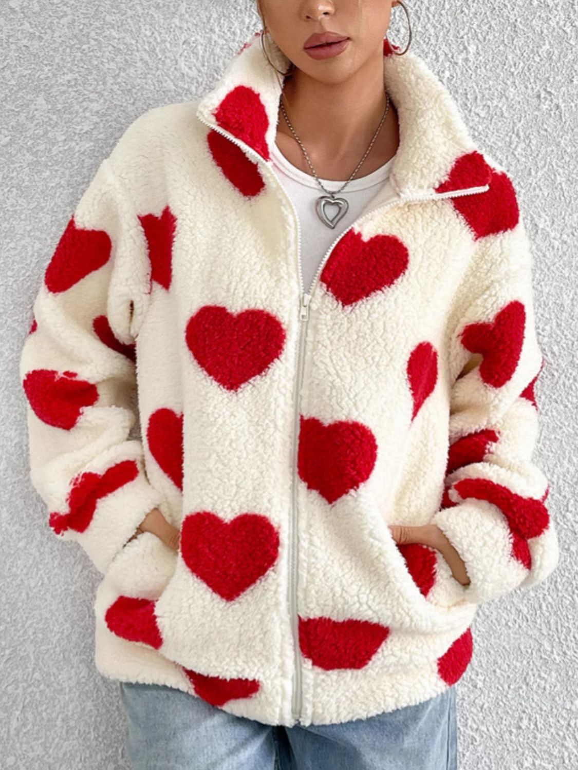 Heart zip up drop shoulder furry jacket.
