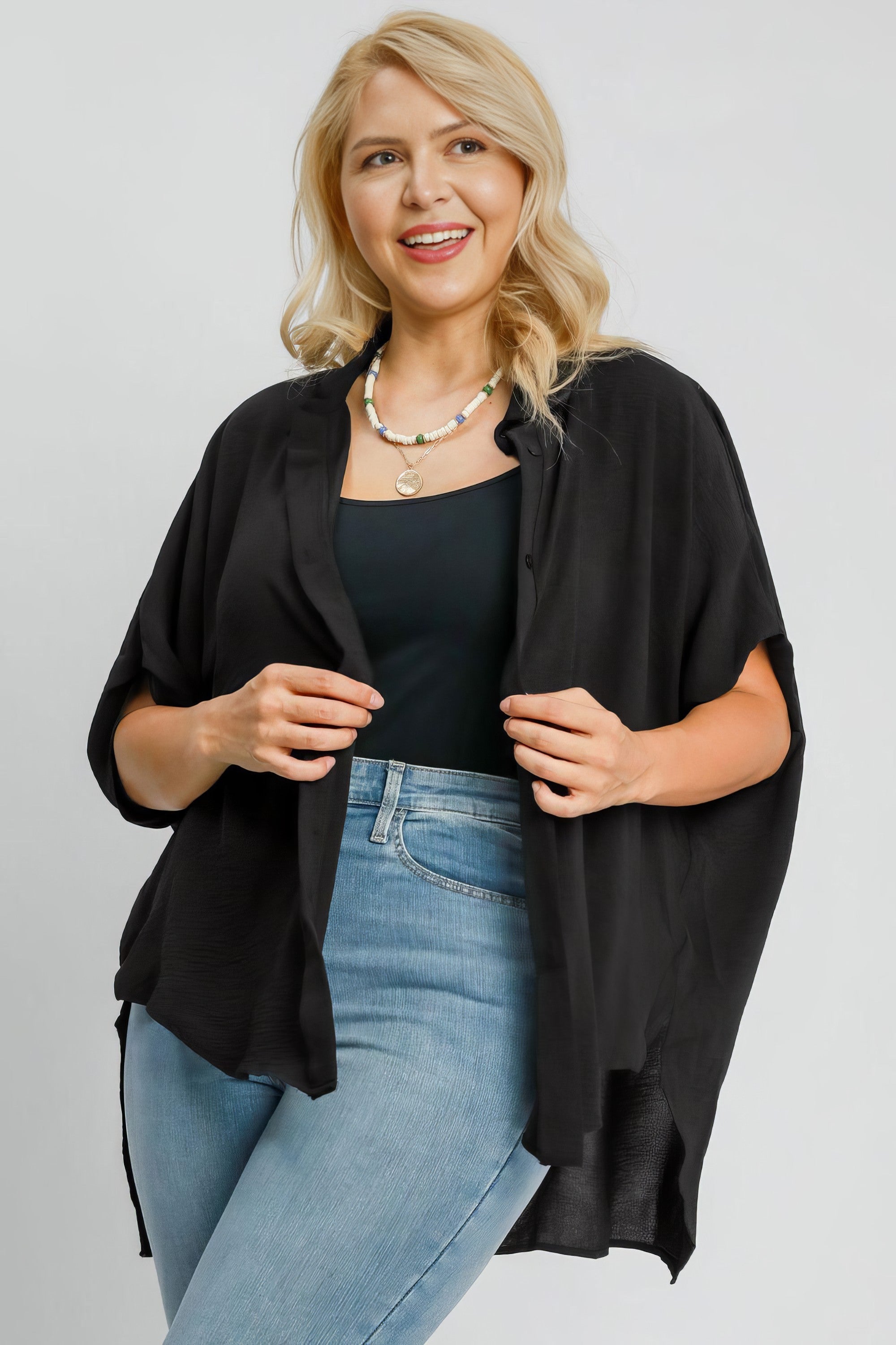 Women's high-low button-up short sleeve shirt with slits