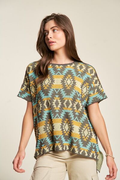Davi Dani high-low geometric round neck knit top.