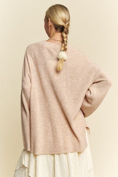 Davi Dani high-low round neck drop shoulder sweater.