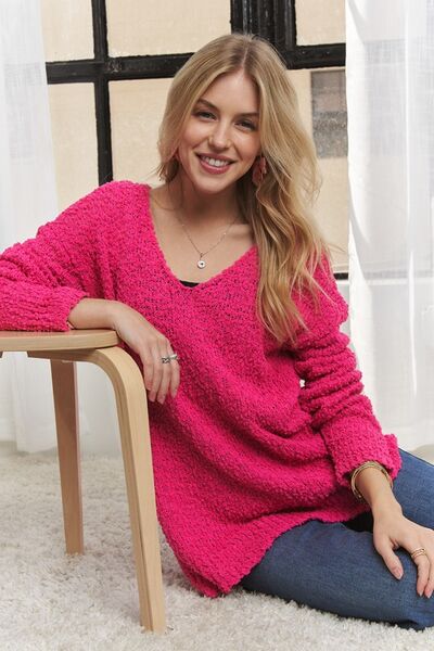 Adora high-low side slit V-neck sweater.