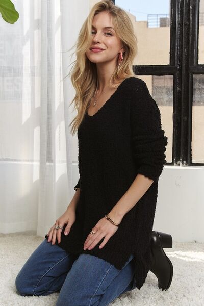 Adora high-low side slit V-neck sweater.