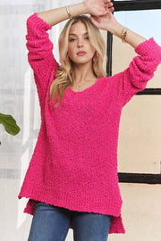 Adora high-low side slit V-neck sweater.
