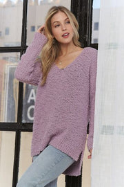 Adora high-low side slit V-neck sweater.