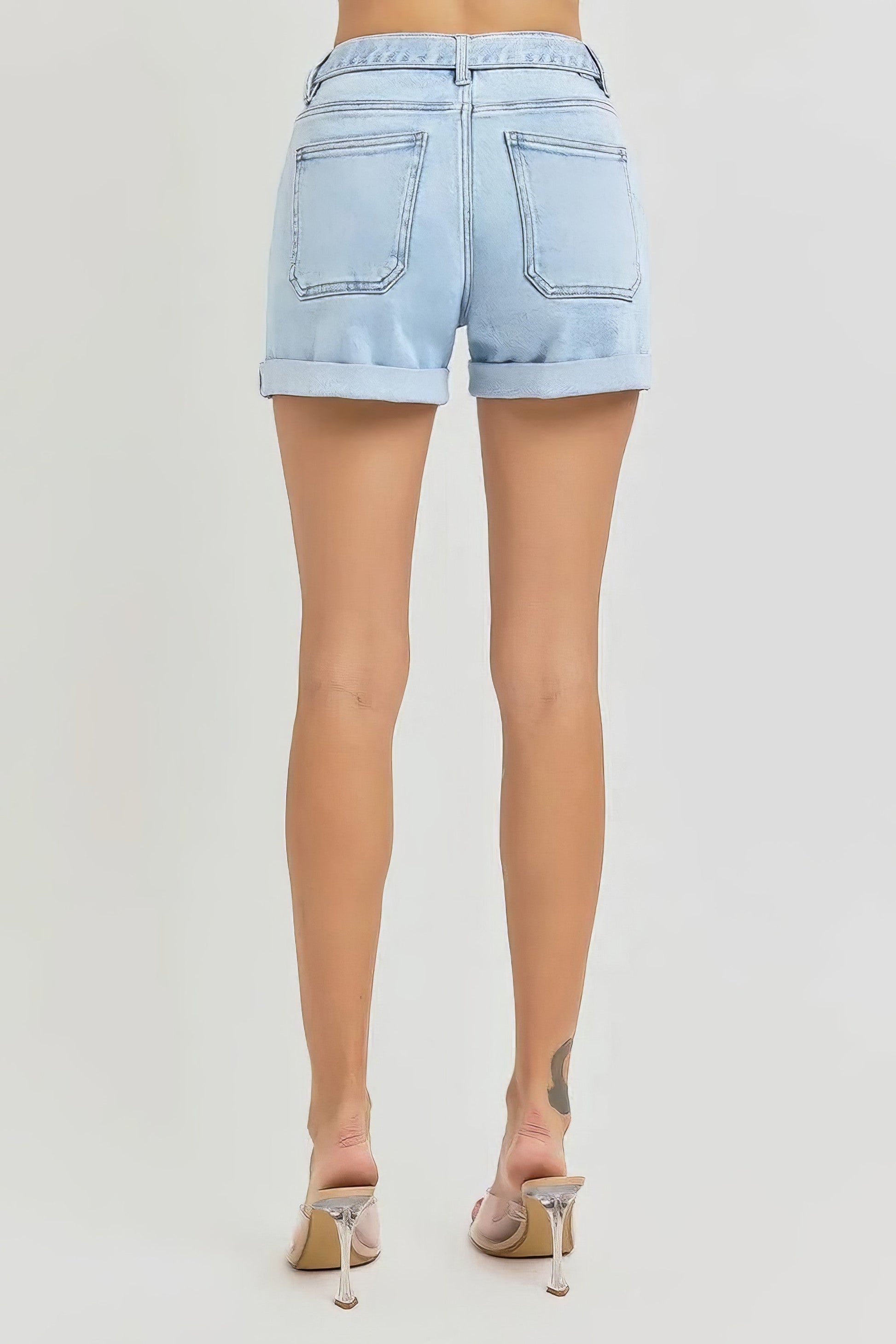 Plus size high rise belted roll-up denim shorts with pockets.