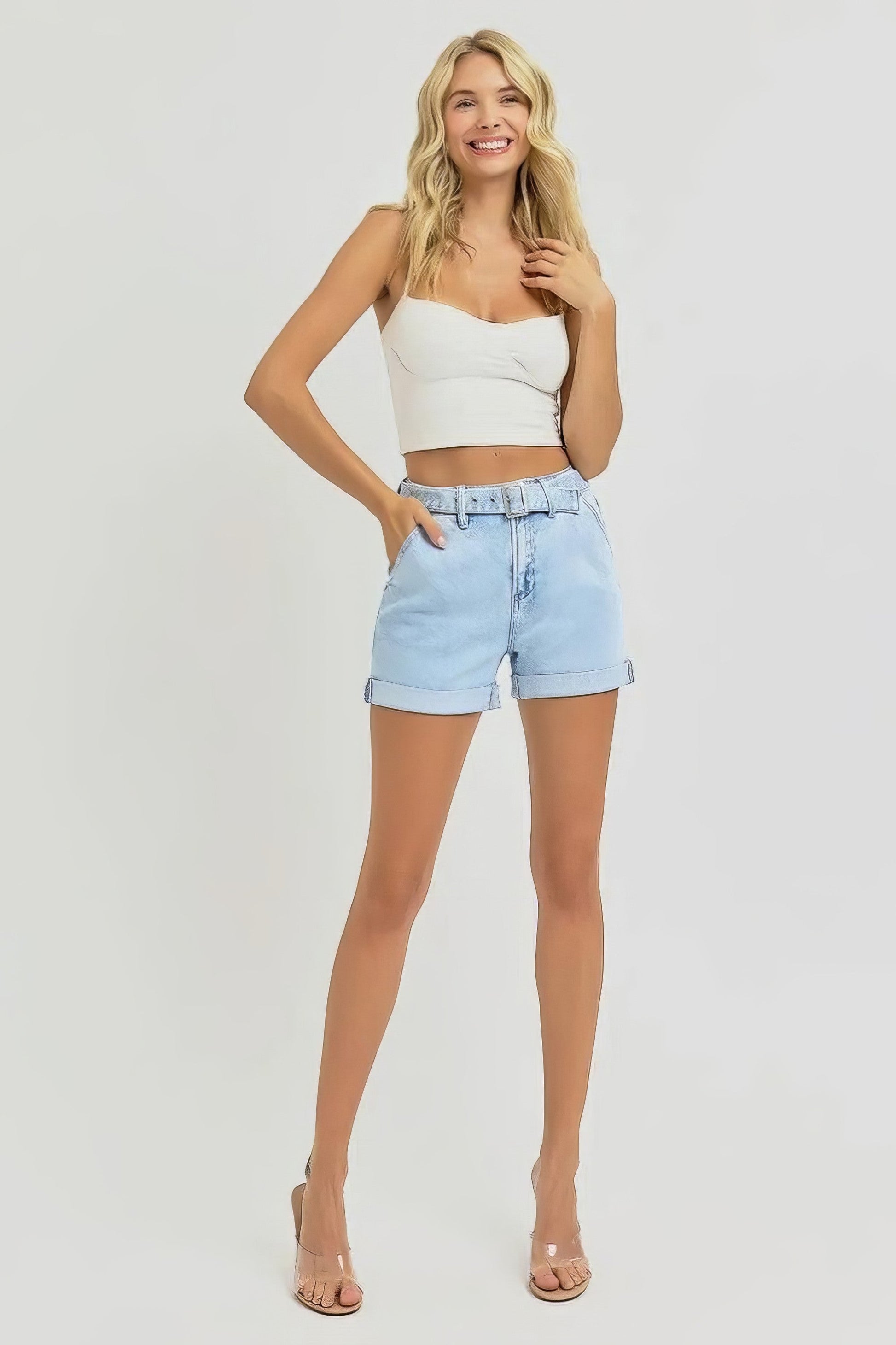 Plus size high rise belted roll-up denim shorts with pockets.