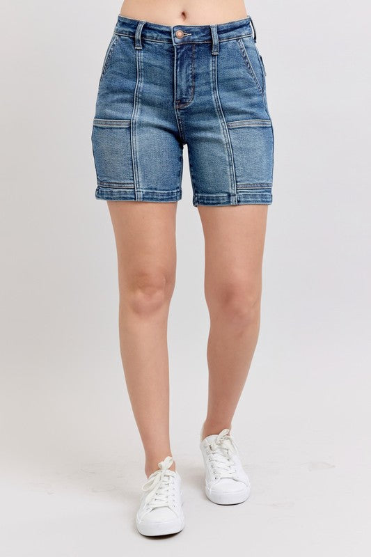 Plus size high rise denim shorts with pockets.