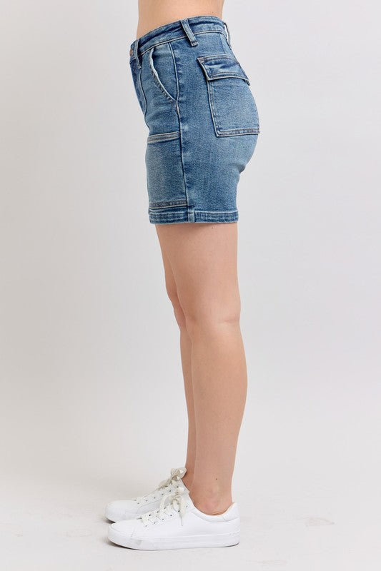 Plus size high rise denim shorts with pockets.