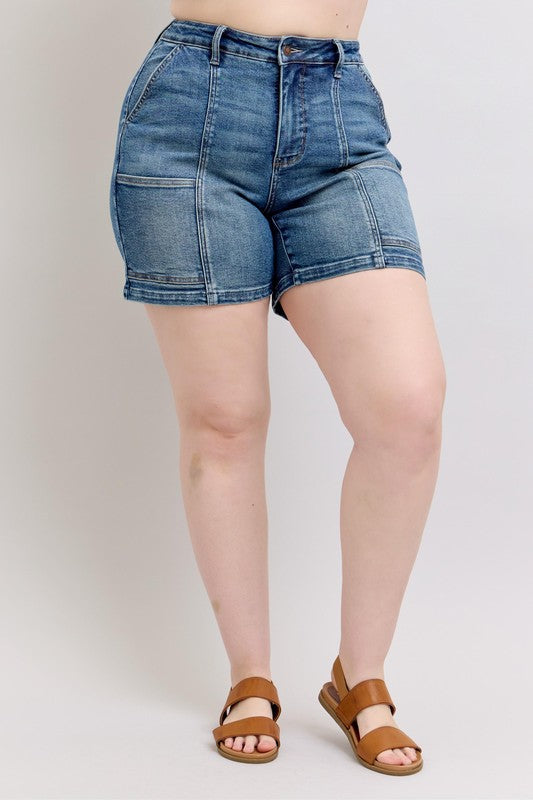 Plus size high rise denim shorts with pockets.