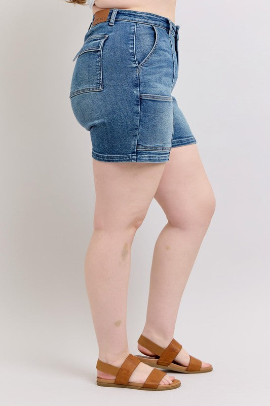 Plus size high rise denim shorts with pockets.