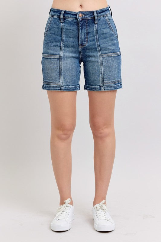 Plus size high rise denim shorts with pockets.