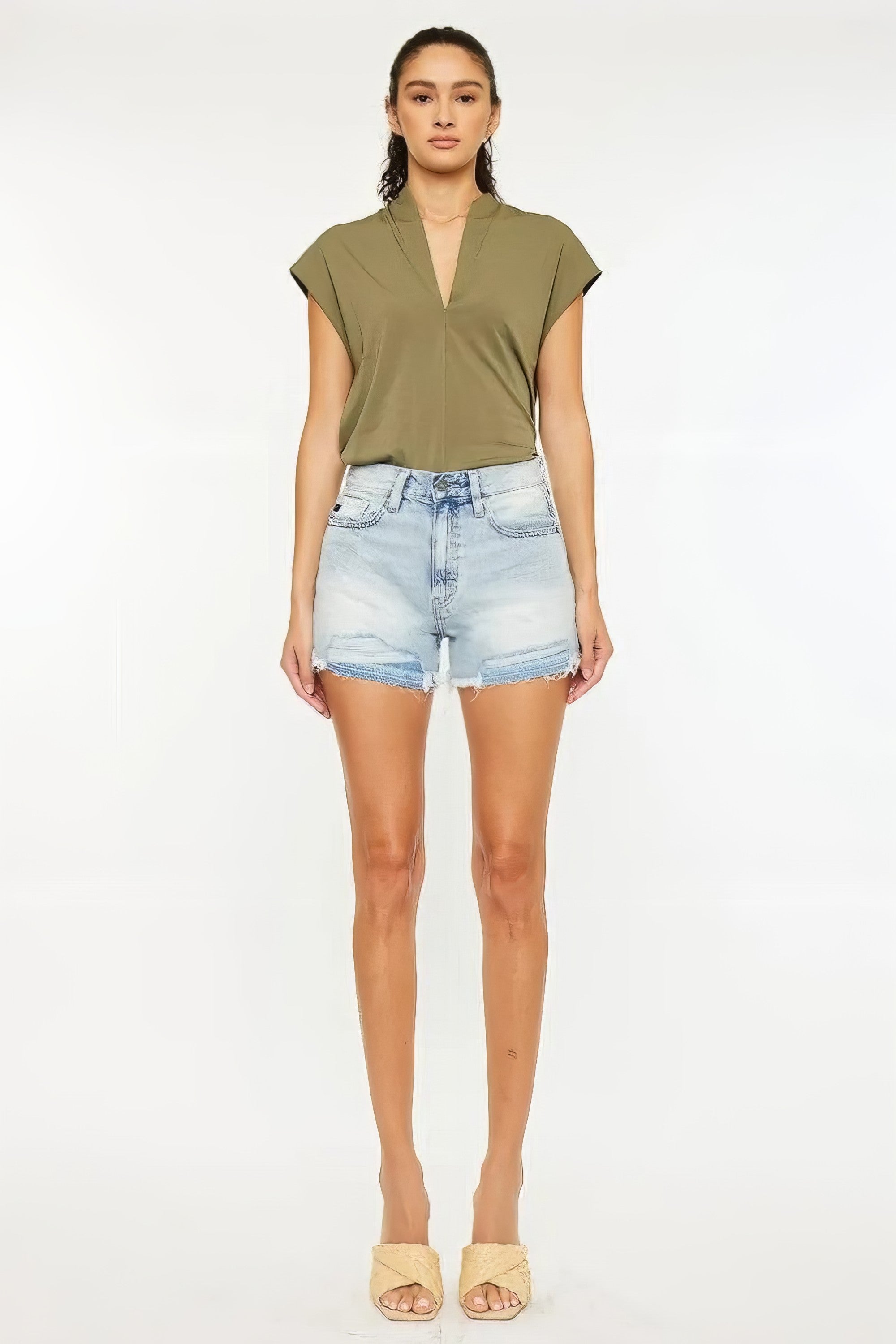 High rise raw hem denim shorts with pockets.