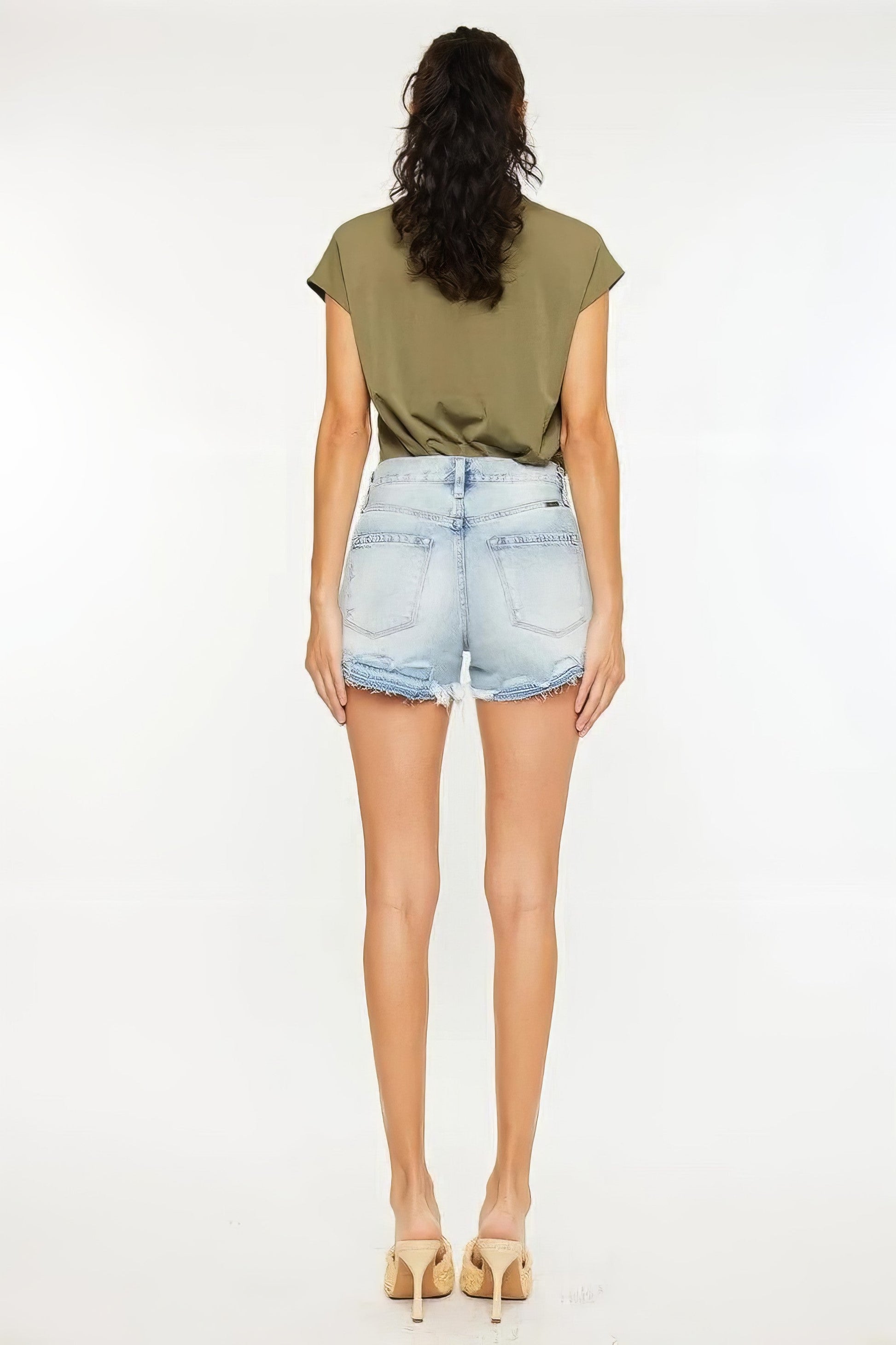 High rise raw hem denim shorts with pockets.