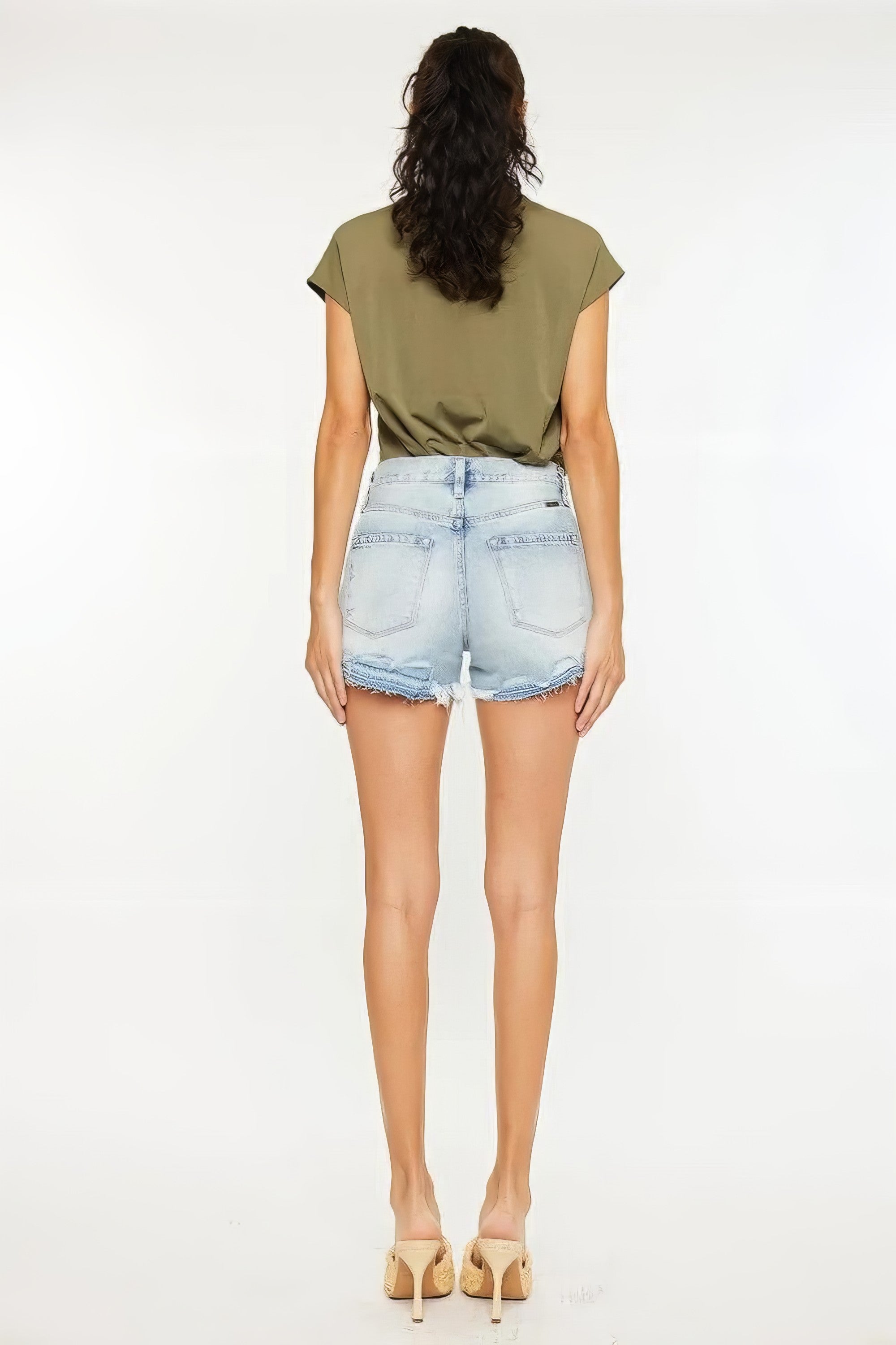 High rise raw hem denim shorts with pockets.