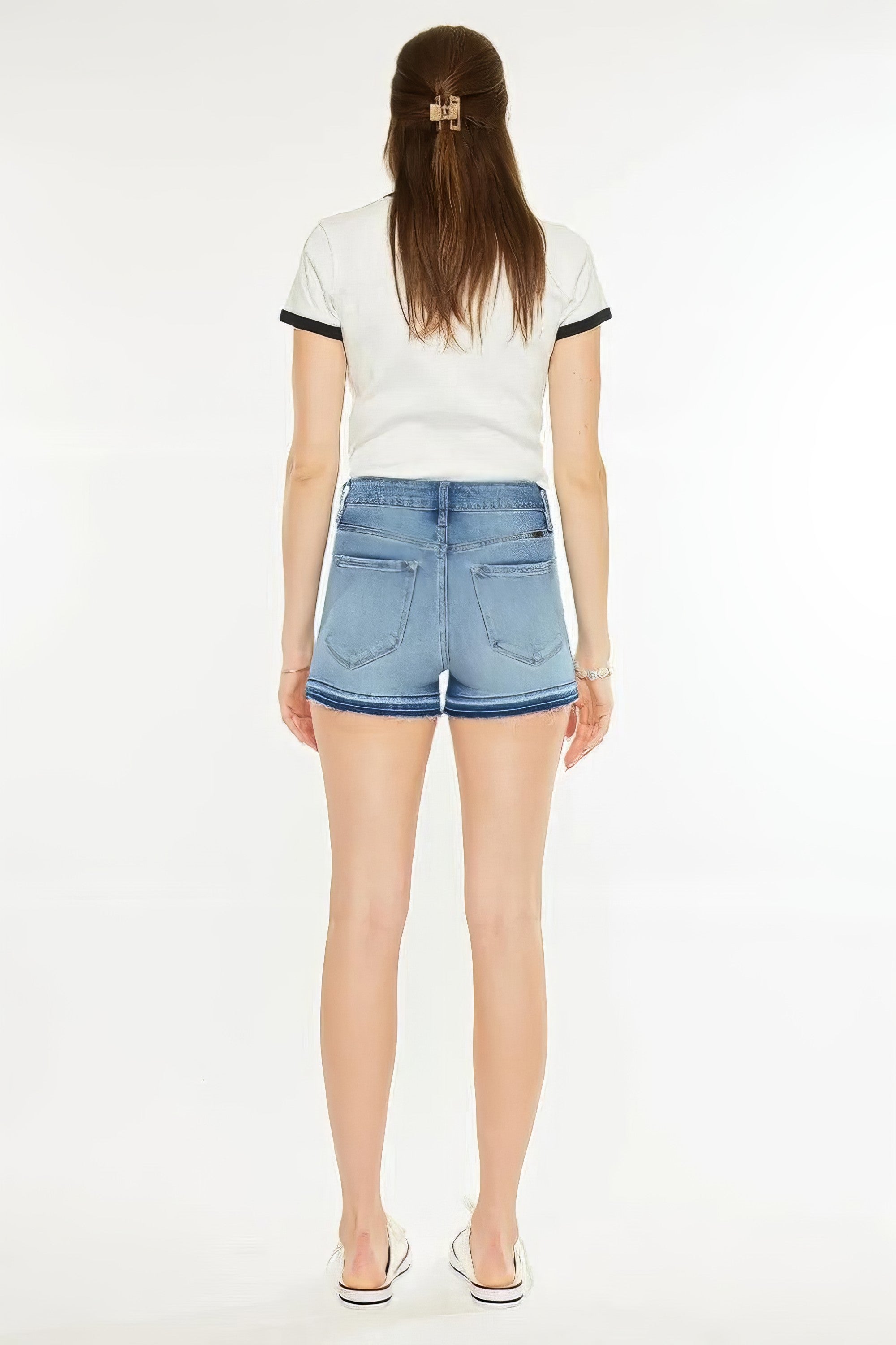 High rise release hem denim shorts with pockets and subtle distressing.