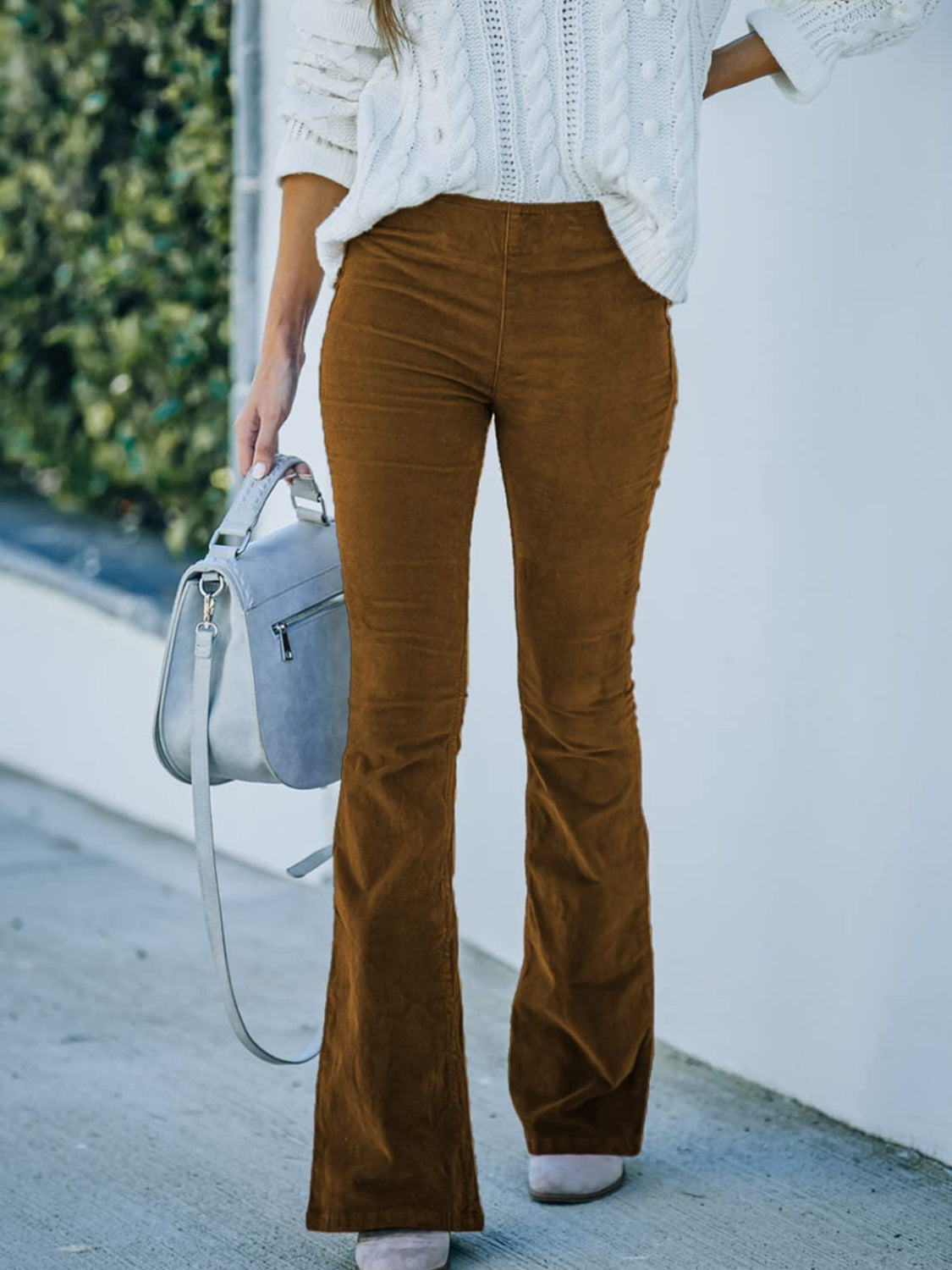High waist bootcut pants, opaque.