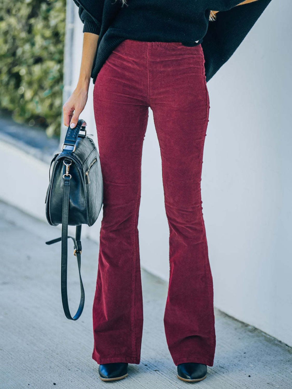 High waist bootcut pants, opaque.
