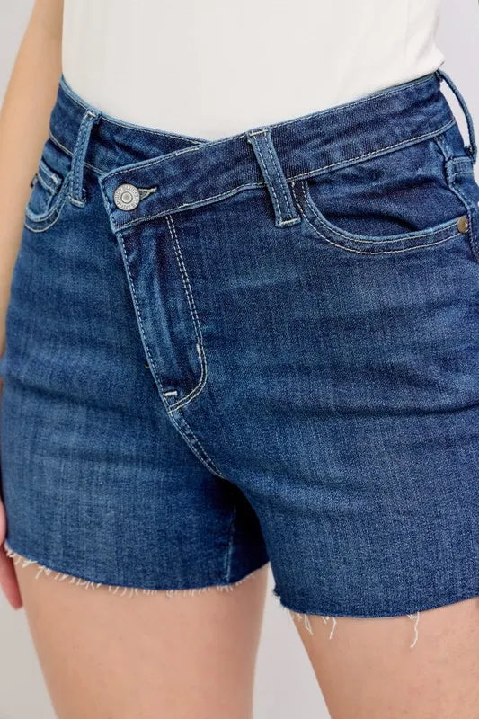 High waist criss-cross waistband denim shorts with pockets.