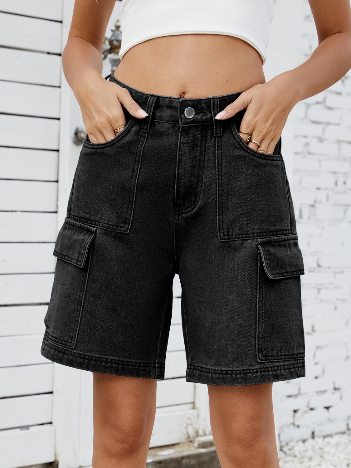 High-waist denim shorts with cargo pockets.