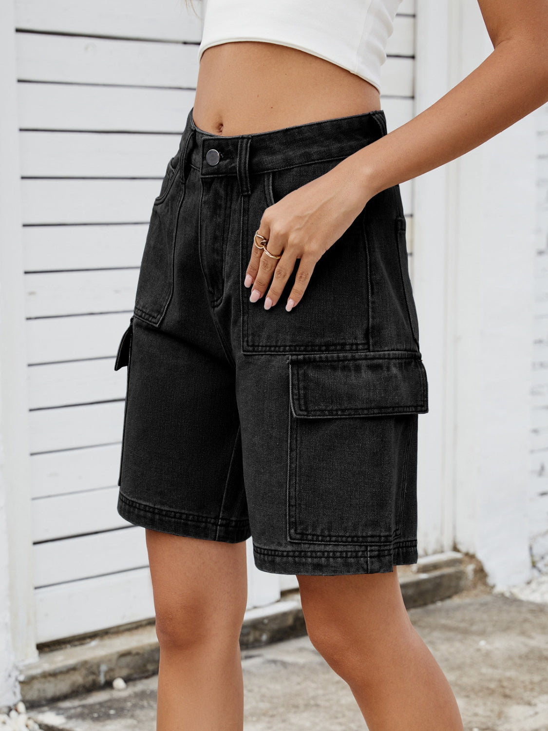 High-waist denim shorts with cargo pockets.