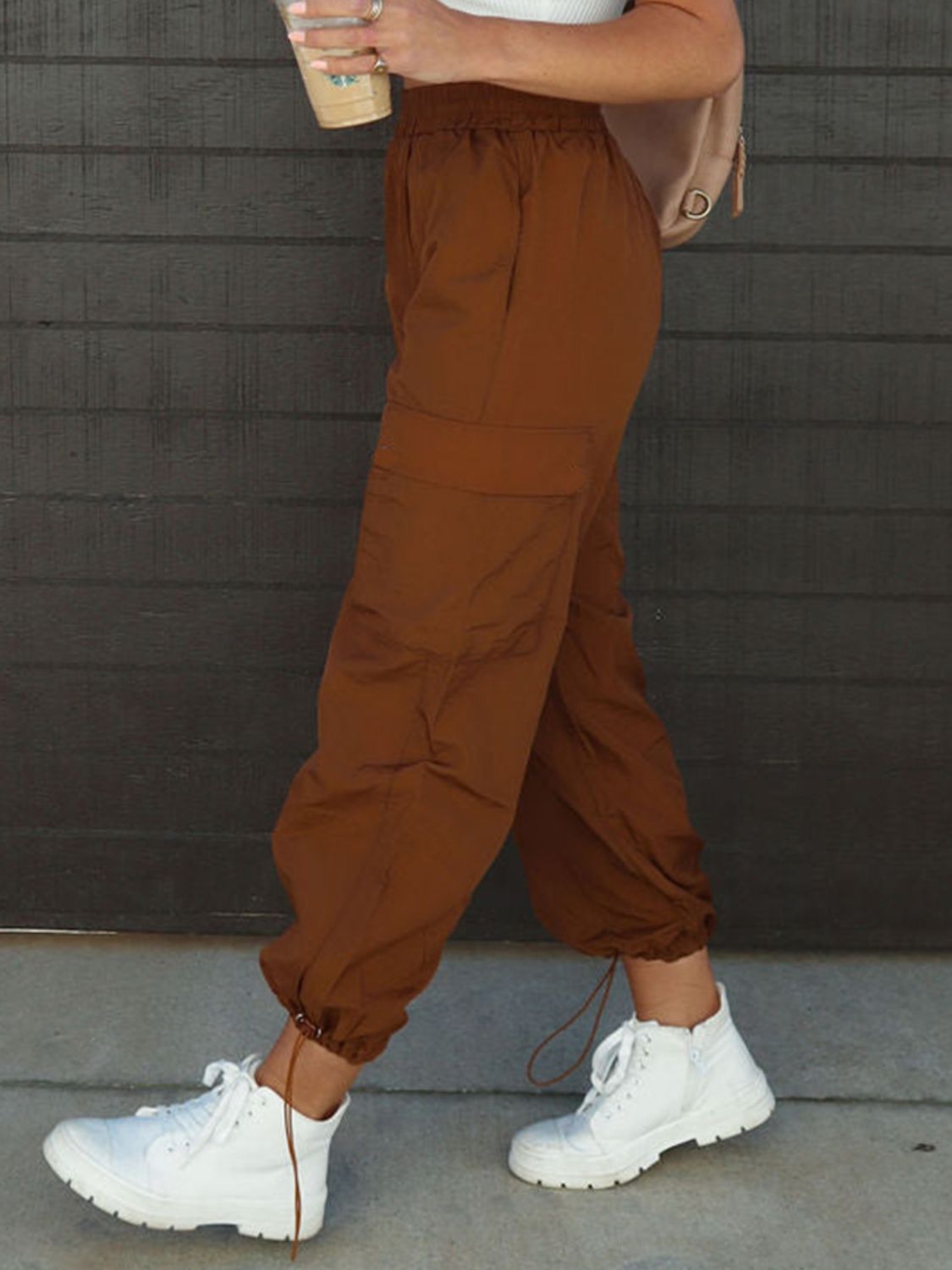 High waist drawstring pants with pockets, opaque.