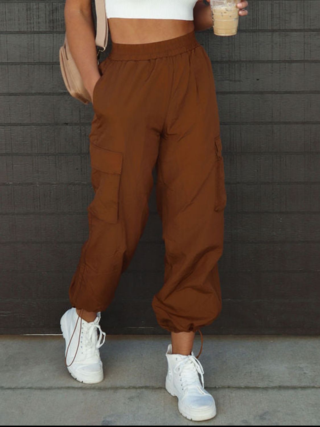 High waist drawstring pants with pockets, opaque.