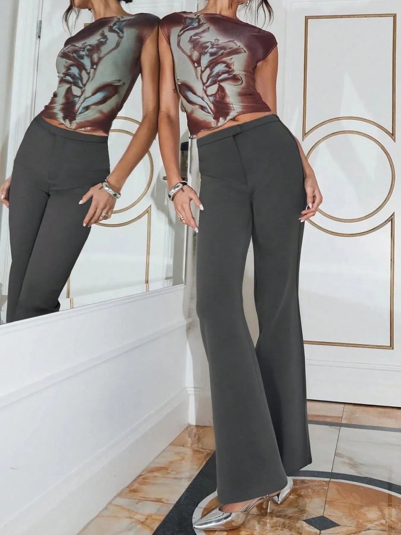 High waist flare leg trousers with buttons and pockets.